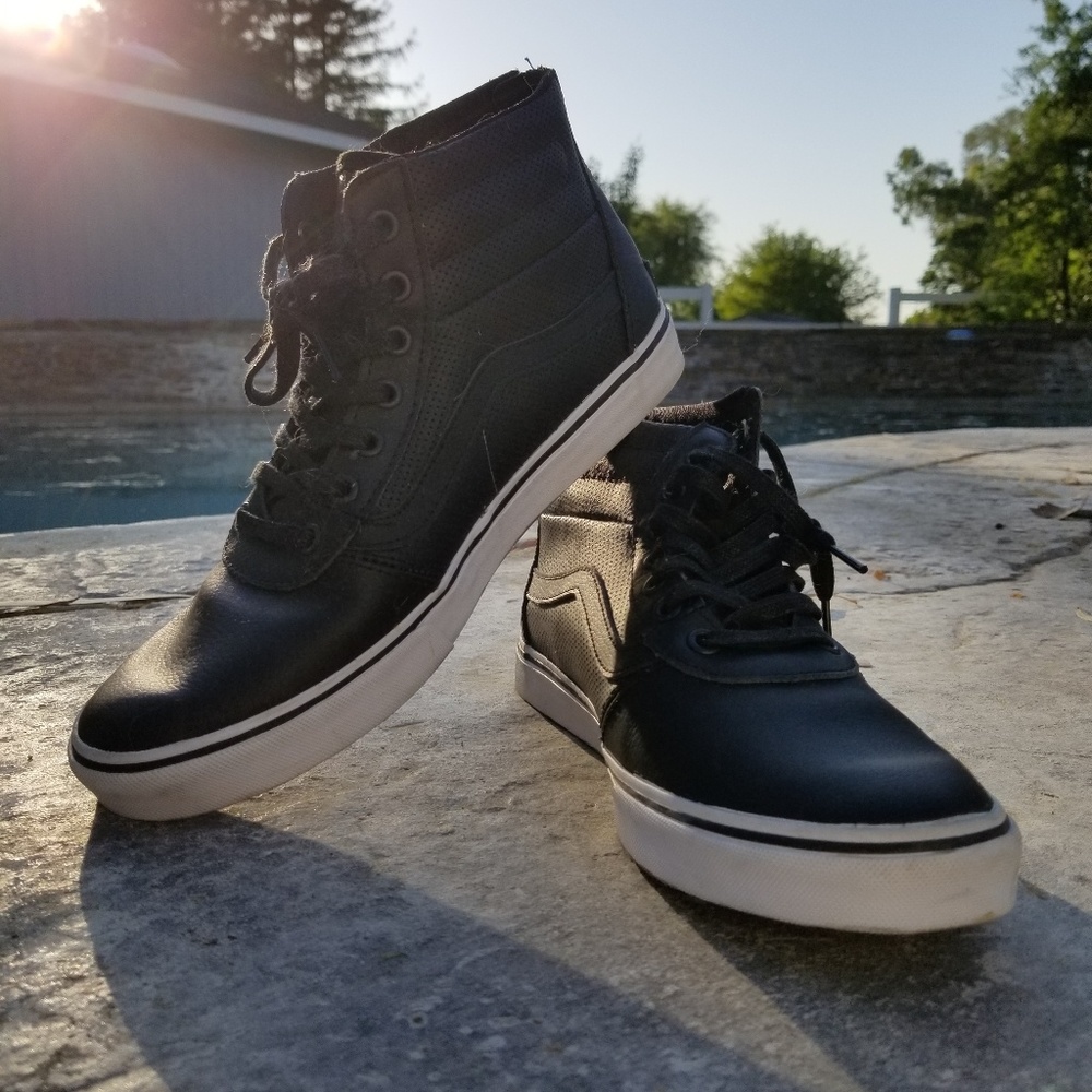 Black leather high top vans